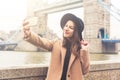 Fashionable girl taking a selfie in London Royalty Free Stock Photo