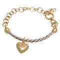 Fashionable golden bracelet with heart shape pendant Royalty Free Stock Photo