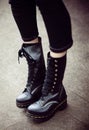 Fashionable gothic leather boots. Shoes concept, fancy unisex stuff