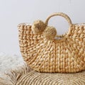 Fashionable handmade natural organic rattan bag. Trandy bamboo eco bag from bali isolited on white background