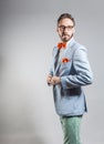 Fashionable handsome stylish bearded man in light blue blazer Royalty Free Stock Photo