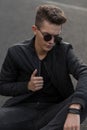 Fashionable handsome young guy with stylish sunglasses Royalty Free Stock Photo