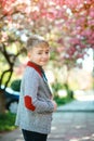 Fashionable kid in spring outdoors. Portrait of handsome young boy Royalty Free Stock Photo