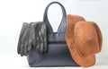 Fashionable leather bag, gloves, felt hat Royalty Free Stock Photo