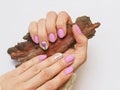 Fashionable lilac manicure design on your hand. Royalty Free Stock Photo