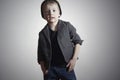 Fashionable little Boy in cap and jeans.Fashion Children