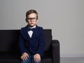 Fashionable little boy in suit and glasses.stylish child