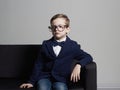 Fashionable little boy in suit and glasses.stylish child Royalty Free Stock Photo