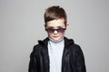 Fashionable little boy in sunglasses. stylish kid Royalty Free Stock Photo