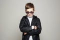 Fashionable little boy in sunglasses. stylish kid Royalty Free Stock Photo