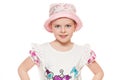 Fashionable little cute girl in shirt and hat, isolated on white background