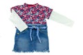 Fashionable little girl shirt with floral print and a blue jeans