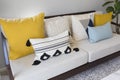 Fashionable living room interior with yellow and blue accents. Royalty Free Stock Photo