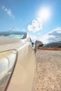 Fashionable luxury empty car with open roof is parking on road. Wonderful landscape with sky in background Royalty Free Stock Photo