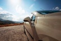 Fashionable luxury empty car with open roof is parking on road. Wonderful landscape with sky in background Royalty Free Stock Photo