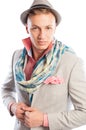 Fashionable male model wearing suit, hat and a scarf Royalty Free Stock Photo