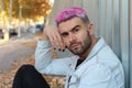 Fashionable male rocking black nail polish and pink hair Royalty Free Stock Photo