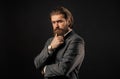 Fashionable man wear hand watch. formal fashion model. handsome man on gray background. serious bearded businessman Royalty Free Stock Photo
