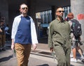 MILAN, ITALY -JUNE 16, 2018:Fashionable men walking in the street before MARNIE fashion show, Royalty Free Stock Photo