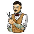 Fashionable mustached tattooed barber