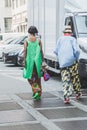 Fashionable people posing during Milan Men`s Fashion Week