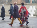 MILAN - FEBRUARY 22, 2018: Fashionable woman walking in the street after LES COPINS fashion show Royalty Free Stock Photo