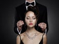 Fashionable photo of beautiful naked lady and man in suit Royalty Free Stock Photo