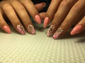 Fashionable pink manicure with a stylish design on long nails