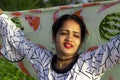 Fashionable portrait of an indian girl model with Colorful scarf waving from top of head, joy, happy , holidays Royalty Free Stock Photo