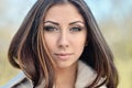 Fashionable portrait of lady with long hair in city