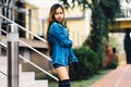 Fashionable pretty young woman wearing striped knee socks Royalty Free Stock Photo