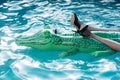 Fashionable shoe and leather products. inflatable crocodile in swimming pool Royalty Free Stock Photo