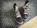 Fashionable shoes on gray striped carpet Royalty Free Stock Photo