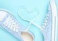 Fashionable sneakers, laces in the shape of heart Royalty Free Stock Photo