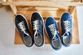 Fashionable suede sneakers. Sport shoes. Expensive footwear or loafers isolated on white background with different thing