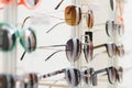 fashionable sunglasses on the shop shelf. Royalty Free Stock Photo