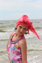 Fashionable teen girl on the beach Royalty Free Stock Photo