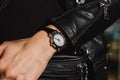 Fashionable watch on a woman's hand. Classic stylish wrist watch