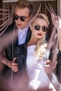 Fashionable wedding couple. Bride and Groom. Outdoor portrait