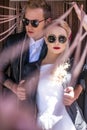 Fashionable wedding couple. Bride and Groom. Outdoor portrait Royalty Free Stock Photo