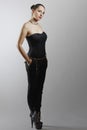 Fashionable woman in black jumpsuit Royalty Free Stock Photo