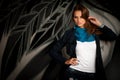 Fashionable woman with blured graffitti in background Royalty Free Stock Photo