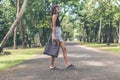 Fashionable woman with luxury snakeskin python handbag outside. Snakeskin fashion concept. Royalty Free Stock Photo