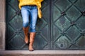 Fashionable woman standing in old city