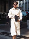 MILAN, ITALY -JUNE 16, 2018:Fashionable woman walking in the street before MARNIE fashion show, Royalty Free Stock Photo