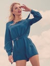 Fashion model wearing blue jumpsuit