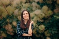 Stylish Fashion Girl with Plaid Shirt and Tassel Earrings Royalty Free Stock Photo