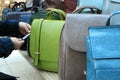 Fashionable women`s handbags in the store