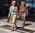 MILAN, ITALY -JUNE 16, 2018: Fashionable women walking in the street before MARNI fashion show, during Milan Fashion Week Royalty Free Stock Photo