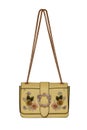 Fashionable yellow female luxury women bag isolated on a white background. Fashionable womans accessories